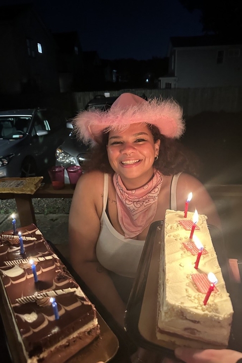 Annie holding a cake